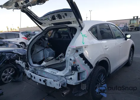 2021 Mazda Cx-5 Touring z USA, uszkodzony, nr VIN JM3KFACM5M1384831